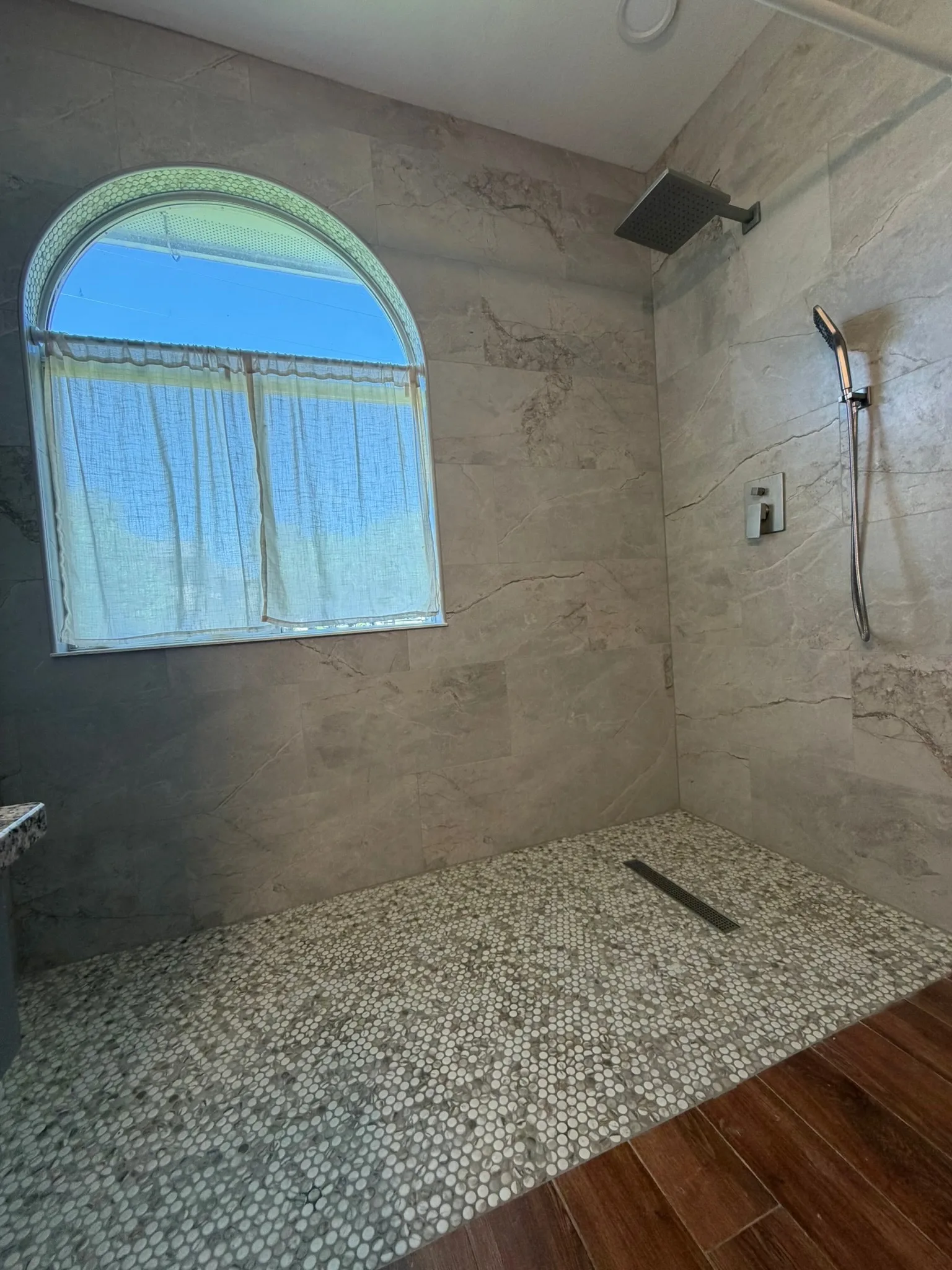 Double vanity bathroom with walk-in shower