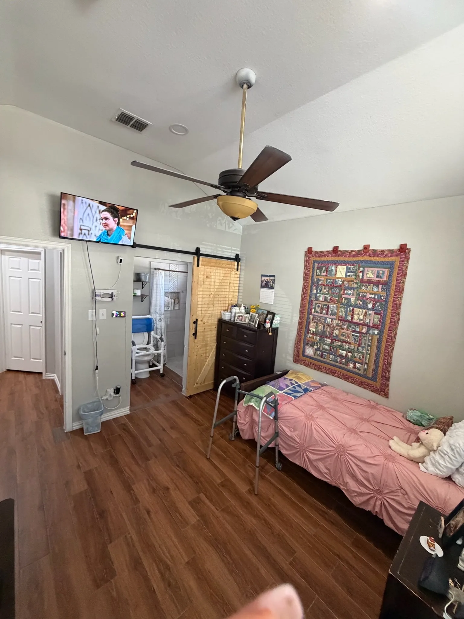Bright resident bedroom with large windows
